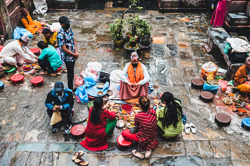 kathmandu, nepal.14th august, 2023: devotee prepared for doing offers at kathmandu street