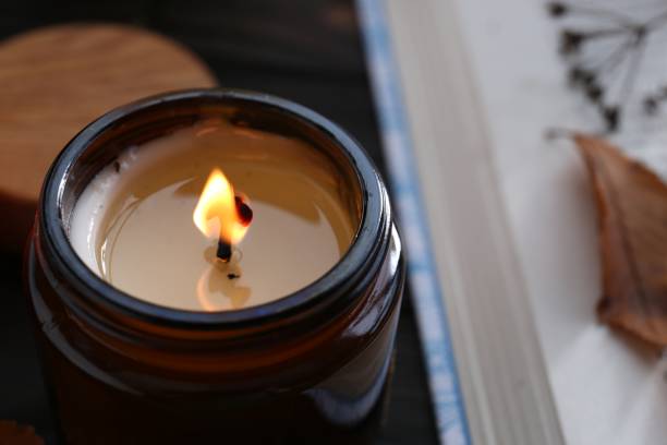 istock Beautiful burning candle, closeup with space for text. Autumn atmosphere 1802755699