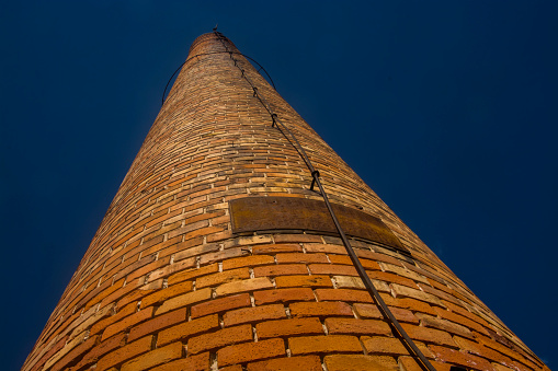 Huge chimney of the old Silk Factory in Mohacs in South Hungary