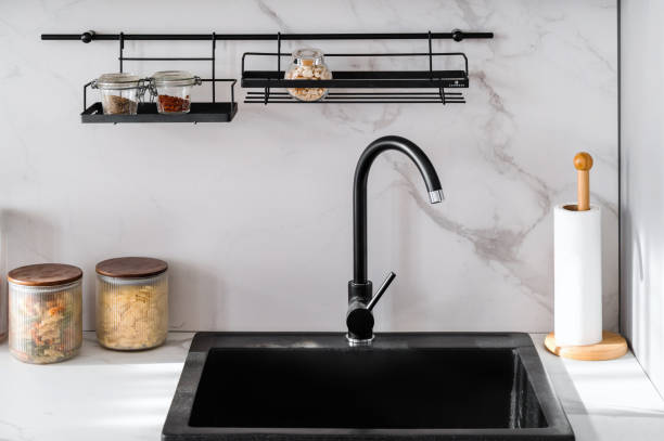 istock Black kitchen sink and water tap in modern style interior 1802759951