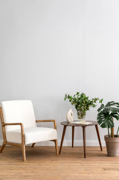 istock Home interior with chair and decor on side table 1802760478