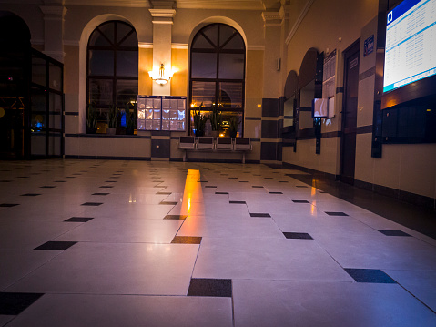 Shot of the waiting hall of the train station at night