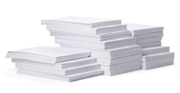 istock Stacks of paper sheets on white background 1802769689