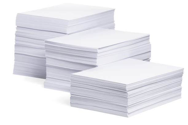 istock Stacks of paper sheets on white background 1802774026