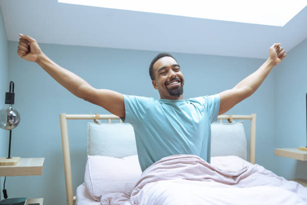 istock Cheerful African American man waking up 1802781051