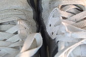 Closeup of white shoelaces on Nike Runner