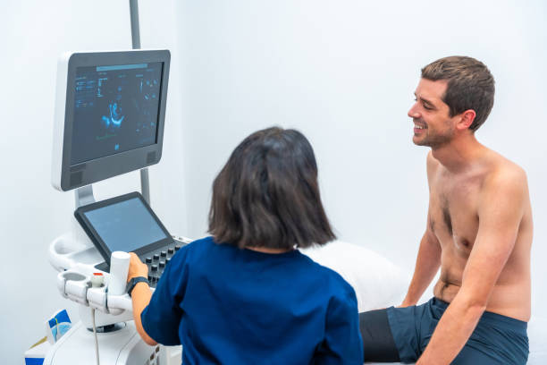 istock Cardiologist performing an echocardiogram on a patient in the hospital 1802793954