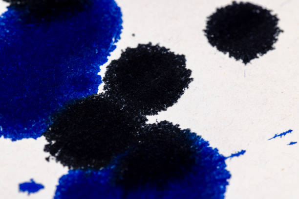 istock grey recycled paper with blue ink drops 1802838136
