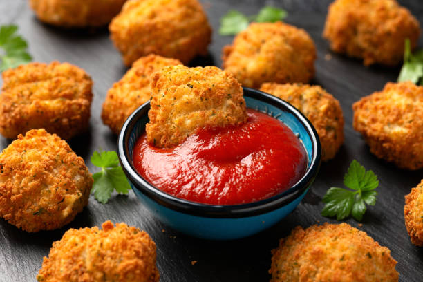 istock Potato croquettes with ham and cheese on stone board 1802881071