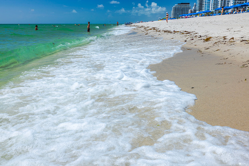 Miami Beach. USA. 11.19.2023.´Beautiful view of Miami Beach with people enjoying their leisure time on sandy shores of Atlantic Ocean.