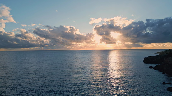 Sunrise marine nature surface drone view. Sun beams reflecting sea water expanse