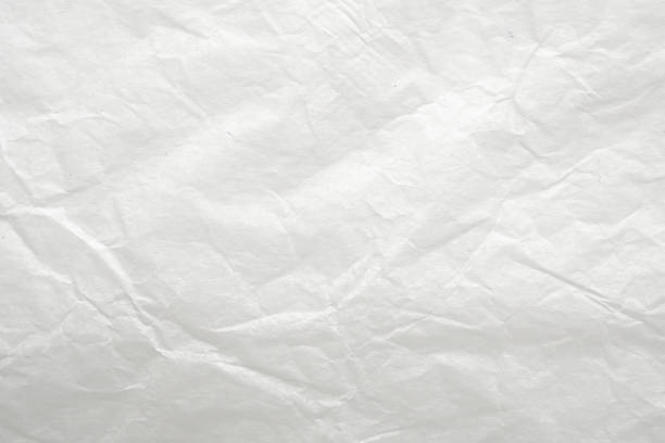 istock Abstract white crumpled and creased recycle paper texture background 1802989695