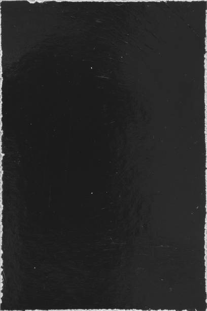 istock Empty old vintage black scratch torn poster overlay texture background 1802990066