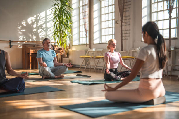 istock Indian Yoga Teacher Doing Meditation 1803004451