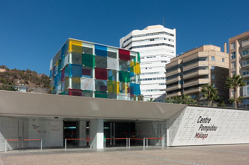 Exterior of and entrance to the Centre Pompidou, Málaga, Spain, which was established in 2015 as the first branch of the modern art museum group to be located outside France. It is located in the harbour area, Muelle Uno.