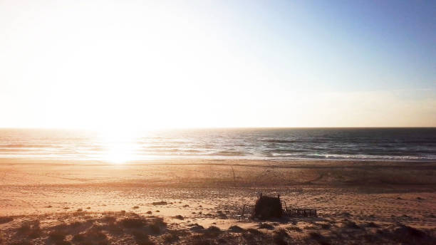 istock Aerial view of beach at sunset 1803023638