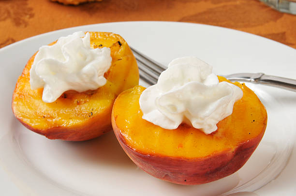 istock Grilled peaches with whipped cream 180303157