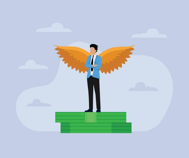 istock Businessman with wings standing on stack of money 1803073391