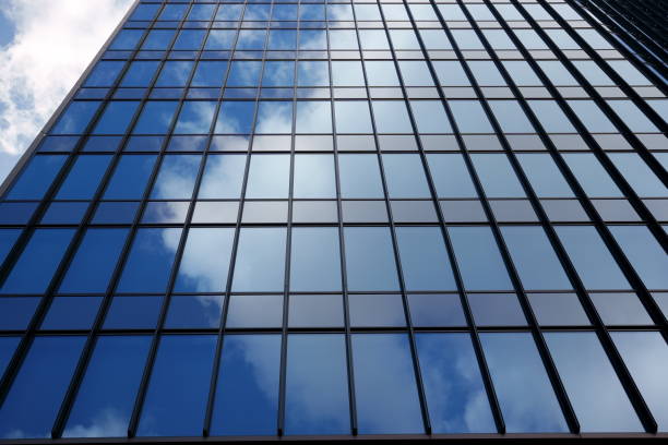 istock Sky and clouds reflected in the windows of a skyscraper 1803172608