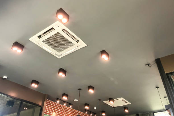 istock Modern ceiling mounted cassette type air conditioning system in coffee shop 1803190269