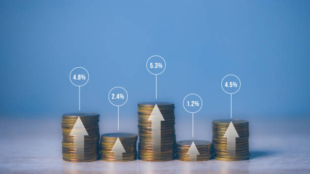 istock Stacking coins different height for interest rates from different investment, financial investment business stock growth. copy space. 1803199436