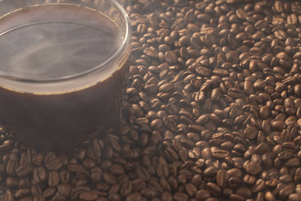Cup of coffee and coffee beans
