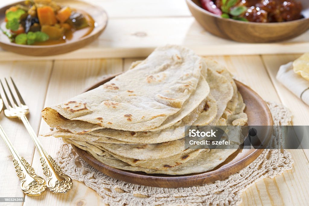 Chapatti roti - Zbiór zdjęć royalty-free (Azjaci)