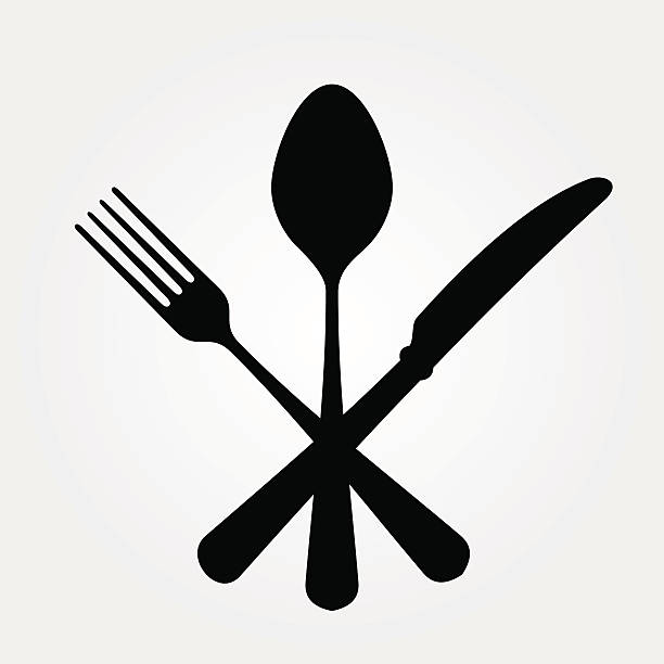 A picture of a black spoon for and knife Black cutlery setting isolated on white background. EPS version 10 with transparency included in download. cooking silhouettes stock illustrations