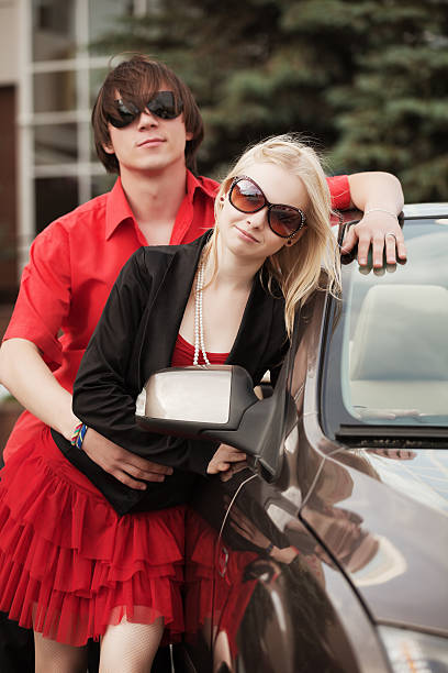istock Young couple with a convertible car 180328796