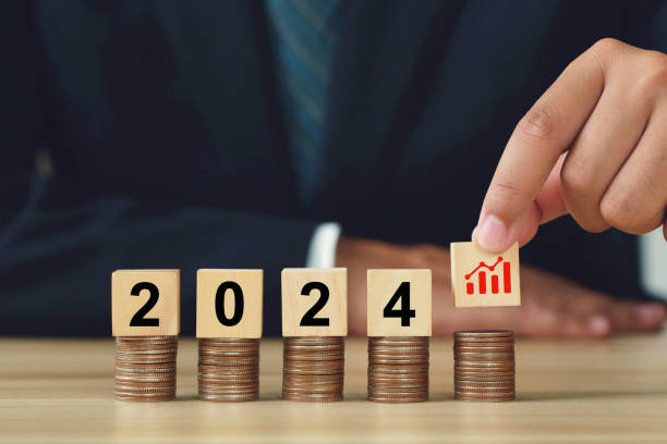 istock Businessman holding wooden cube increase arrow graph corp 1803294608