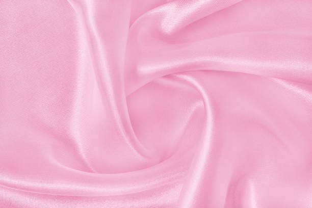 istock Pink fabric cloth texture for background and design art work, beautiful crumpled pattern of silk or linen. 1803299818