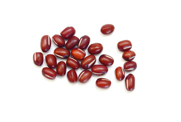 istock Adzuki beans pouring on white background 1803303975
