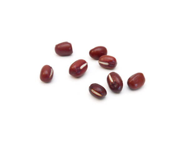istock Adzuki beans pouring on white background 1803305008