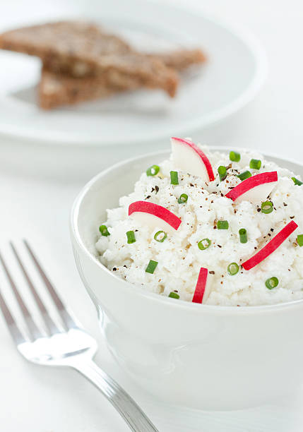 istock Cottage white cheese in a bowl with radish 180330637