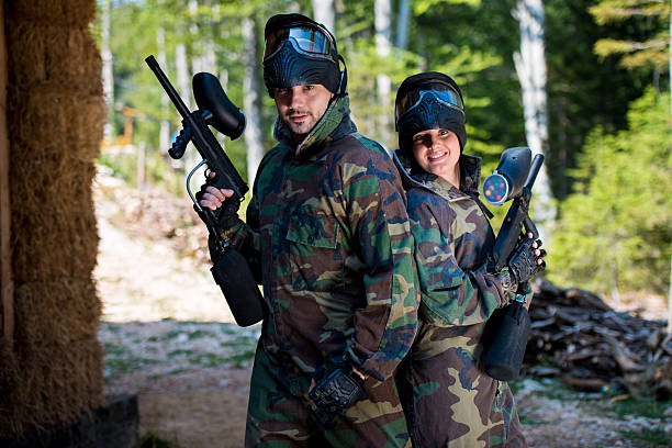 istock girl and guys paintball players team 180331237
