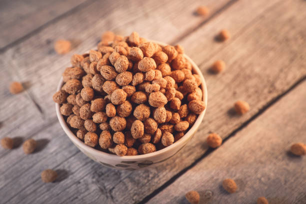 istock Uncooked dried chickpeas in wooden bowl 1803330851
