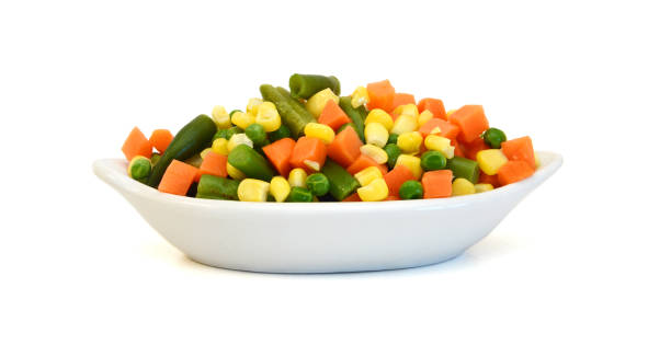 istock Fresh mixed vegetables on white. Golden mix. 1803337653