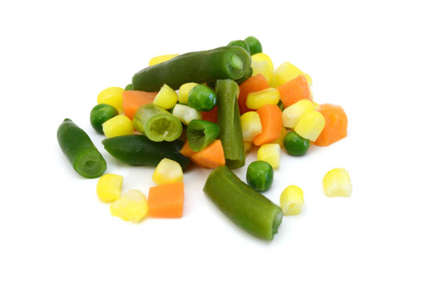 istock Fresh mixed vegetables on white. Golden mix. 1803341361