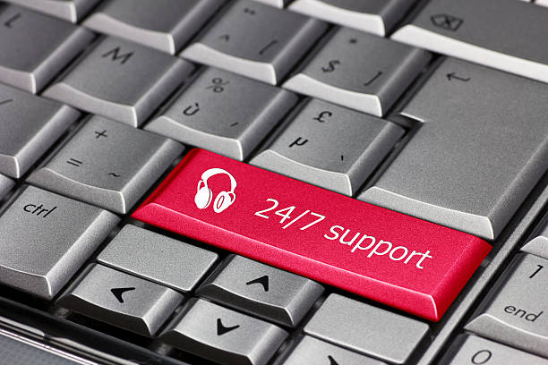 Computer key - 24/7 support with headphone icon stock photo