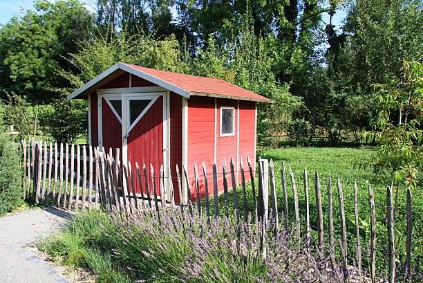 red garden shed stock photo