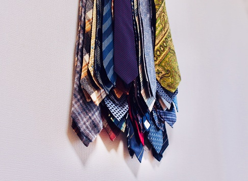 A collection of men's ties in a room.