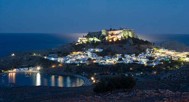 istock Lindos with it's ancient Acropolis at dawn. Rhodes, Greece 180340110