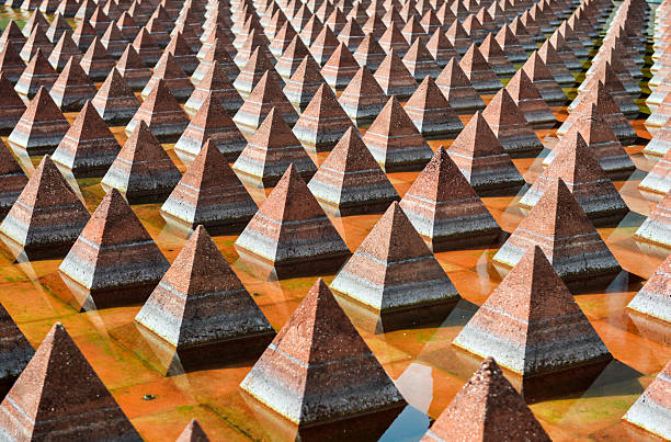 Plaza Juarez, Mexico City, Mexico. A set of 1034 reddish pyramids in a broad pool in Plaza Juarez.