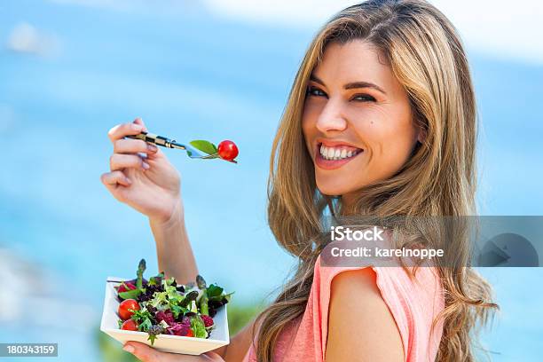 Beautiful Woman Holding Freah Salad Stock Photo - Download Image Now - Beach, Eating, Lettuce