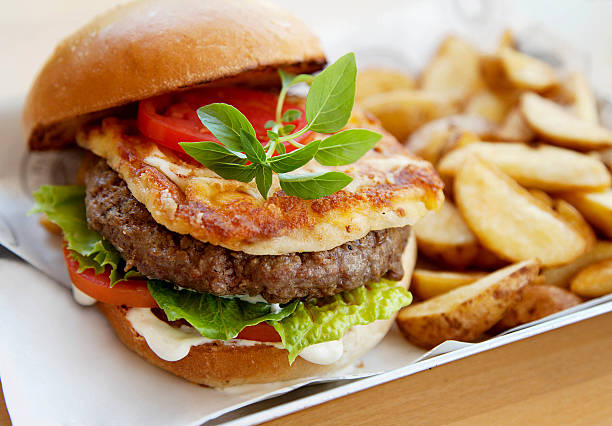 istock hamburger with country potatoes 180343457