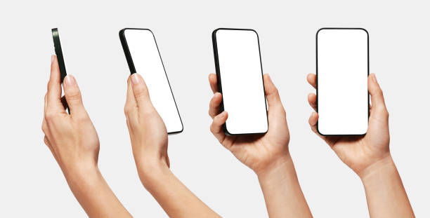 kuvapankkikuvat ja rojaltivapaat kuvat aiheesta 4 älypuhelimen näkymää - pitää sylissä