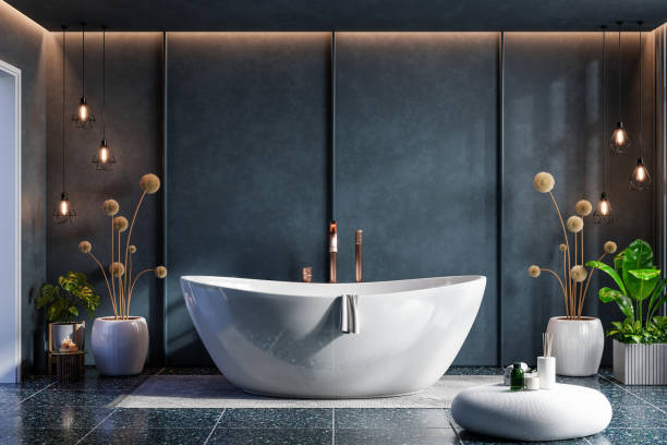 istock Modern Bathroom interior design with white bathtub on grunge dark blue wall 1803514659