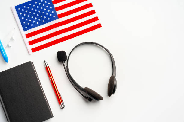istock Flag of USA and headset on white background 1803529930