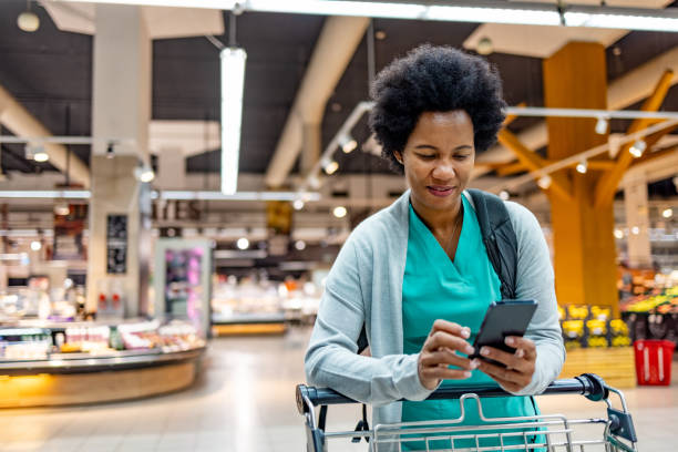 istock Medical Practitioner Shopping For Groceries 1803534260