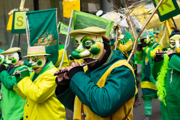 Basel carnival 2023. Piccolo flute players Basel, Switzerland - March 1st 2023. Group of carnival participants playing piccolo flute fastnacht stock pictures, royalty-free photos & images